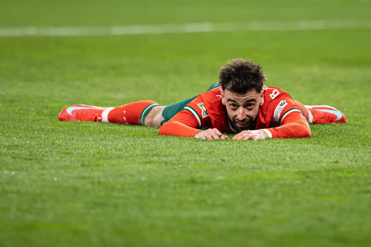 Bruno Fernandes of Portugal lies on the ground during the UEFA Nations League Quarterfinal Leg Two match between Portugal and Denmark
